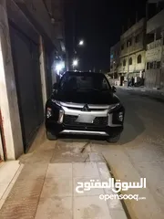  2 بك اب ميتسوبيشي 2022 بحال الوكاله مستخم اول كرت ابيض اربعه جيد لون اسود استخدام بسيط جدا