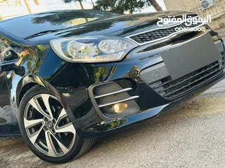  8 كيا ريو 2016 فل مع فتحه مميزه لون اسود نادر ومميز بالنضافه