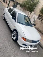  1 ميتسوبيشي لانسر موديل 2000