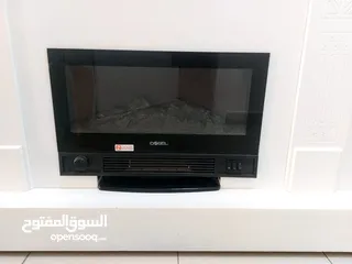  3 دفاية دوسيل مع بيت خشبي مزخرف باللون الأبيض