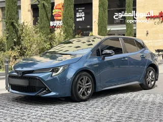  1 ‎تويوتا كورولا 2020 هاتشباك هايبرد (حرة جديد) بحالة الوكالة مميزة