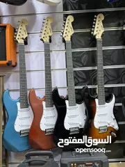  1 جيتار الكترك كفاله سنه كامله  كولتي عالي  مع حقيبه وريشه هديه