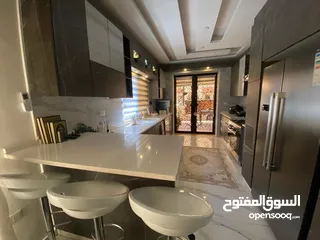  2 شقة مميزة ارضية تشطيب سوبر ديلوكس في أجمل احياء الياسمين خلف مستشفى الحياة