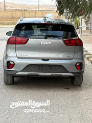  23 كيا نيرو موديل 2022 هايبرد  فحص كامل  عداد  40 الف   لون مميز