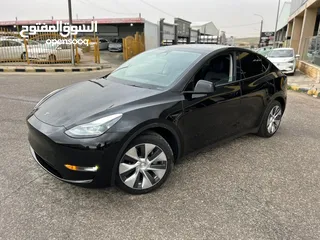  11 TESLA MODEL Y 2022 LONG-RANGE DUAL MOTOR-7 Seats  (سبع مقاعد)