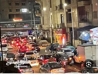  1 محل تجارى متفرع  من ميدان الجيزة