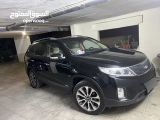  1 كيا سورينتو 2013  13000 دينار