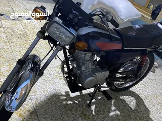  12 دراجه إيراني رقم وسنويه نضيفه 
