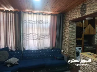  4 شقه ارضيه للبيع كاش او اقساط عن طريق البنك العربي الإسلامي الدولي في عمان حي نزال على الشارع الرئيسي