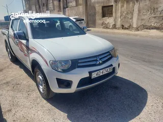  22 ميتسوبيشي L200 موديل 2015 واطي بنزين بحاله الشركه