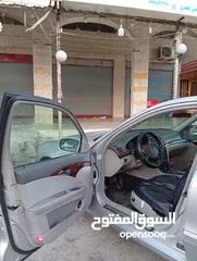  24 مرسيدس للبدل على احدث e200 كرت ابيض 2004