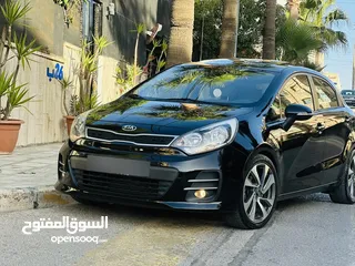  7 كيا ريو 2016 فل مع فتحه مميزه لون اسود نادر ومميز بالنضافه