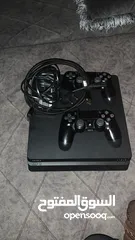  1 جهاز ps4 slim 500gb مع يدتين وشاحن لليدات ولعبتين فيفا 24 gta5