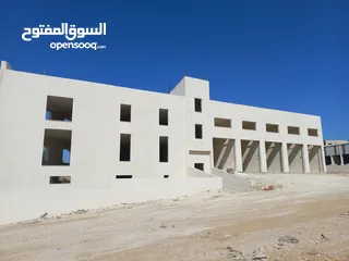  9 مجمع تجاري لتأجير محلات ومخازن بمساحة 50-250 م2، عدنان مسامح