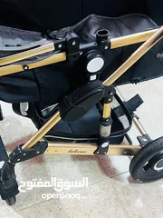  2 كرسي طعام ماركه mamalove  وعربايه شارع belco بيلكو جديد