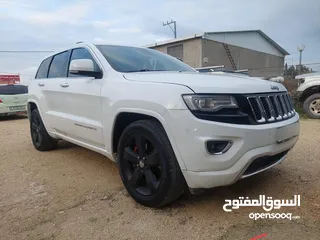  1 جيب جراند شيروكي اوفر لاند 2014 ترخيص 13 فحص نظيف من جميعو