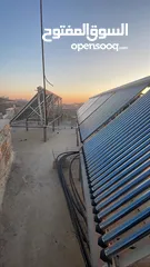  2 200 انبوب زجاجي حراري لتسخين المياه مع قواعد هيكل المنيوم وكل ما يلزم لتثبيته بحالة ممتازة جدا