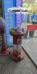  1 ماكينة طابات العاب و علكة