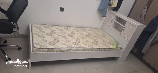  1 brand new wood bed with mattress