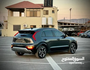  12 كايا نيرو  هايبرد (بنزين+كهرباء ) فل الفل فتحة سقف  /2022 عداد قليل 18000Km