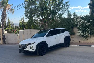  4 هونداي توسان ( هايبرد)  بنزين + كهرباء  فل الفل اضافات