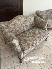  2 Sofa set that includes two couches and one round sitting sofa