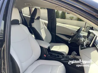  14 تويوتا كورولا 2020 هايبرد لون اسود حره باسم المستورد