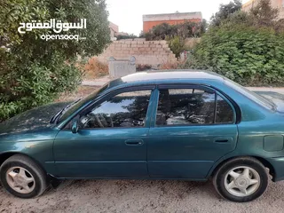  7 تويوتا كورولا 1997 ماتور 1500 CC جير عادي غرفة نظيفة كندشن بحاجة إلى قشاط الفحص مرفق ثلاثة جيد واحد