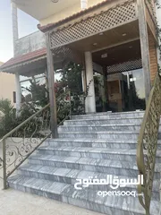  9 ارض دونم مع بيت ارضي وبيت طابقين