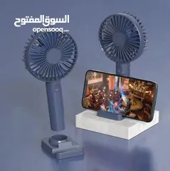  1 مروحة بقاعدة هاتف و بتشحن USB