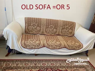  3 an old three seater sofa and a Turkish carpet.