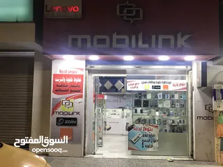  10 محل تجاري للبيع مجهز كامل موقع مميز ملاصق لمعرض شركة زين - شارع باب الواد - الوسط التجاري/ الزرقاء