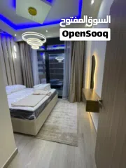  7 شقه كامله الخدمات غرفه وصاله بجوار اكبر بحيره صناعيه بأقل سعر بكل دبي