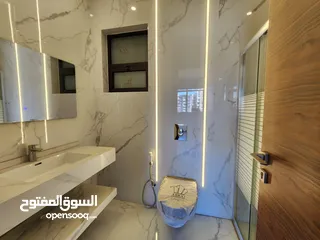  7 شقة طابقية فاخرة للبيع في عبدون ref : 14384