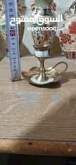  10 مكواي نحاس/ومنضر نحاس ارضية رخام/وكاسة صغيرة نحاس/ومنضرين نحاس وعليهم زي شقف  اضن رخام