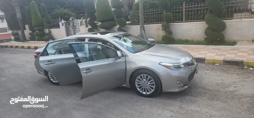  28 تويوتا افالون هايبرد 2015 فل كامل وأعلى صنف Limited وارد و مواصفات أمريكيه مالك واحد فحص كامل