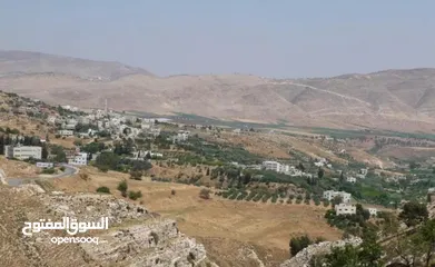  1 ارض في الباذان على الشارع