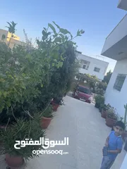  15 ارض دونم مع بيت ارضي وبيت طابقين