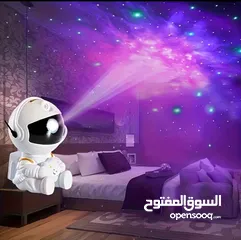  3 Astronaut Star Projector Galaxy Night Sky Decor Lamp متوفر باللون الابيض والاسود ضمان علي المنتج