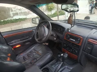  7 مواصفات جيب شروكي 1999