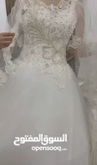  1 فستان زفاف فخم