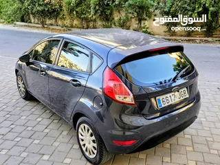 4 فورد فييستا 2014 سيارة القطة مميزة من كل النواحي لون باطوني أصل شركة مميزة
