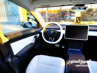  18 تيسلا 2021 فحص كامل 7 جــيــد بدون ملاحظات غرفة جلد ابيض جنط19 لون مميز بحالة الوكالة حره بسعر لقطة