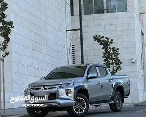  4 ميتسوبيشي L200 2023 لون سلفر مميزه فحص كامل كرت ابيض بحالة الزيرو ماشيه 60 الف قير عادي