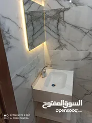  2 شقة ارضية للبيع مع ترس كبير بالزرقاء الجديدة خلف فندق جوابرة تستحق المشاهده