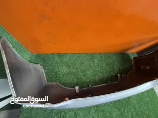  8 صدام خلفي تويوتا بريوس 2010-2015  اصلي مستعمل بحالة جيده موضوح بصور  Toyota Prius 2010-2015