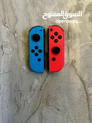  1 Nintendo switch joy con بحاله ممتازه جدا  مع ستيرنج للجوي كون