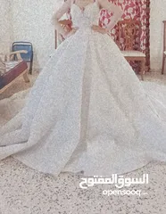  2 فستان عروس ( شبه جديد ) مع كمالياته طرحة شك خرز وبرنس وتاج للبيع مش للاجار استعمال مرة واحدة لعروس.