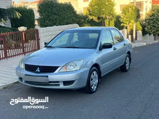  1 ‏متسوبيشي لانسر موديل 2011 نظيفة جدا لا تحتاج إلى صيانة