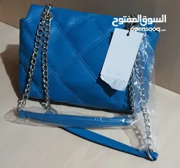  7 شنتة كتف جلد زرقاء